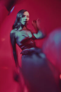 Creative light painting fashion portrait in Las Vegas with pink and blue lighting