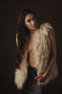 Elegant and sexy beauty photography portrait in Las Vegas of woman with fur shaggy vest