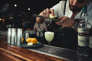 Elevated professional photography branding portraits inside swanky bar